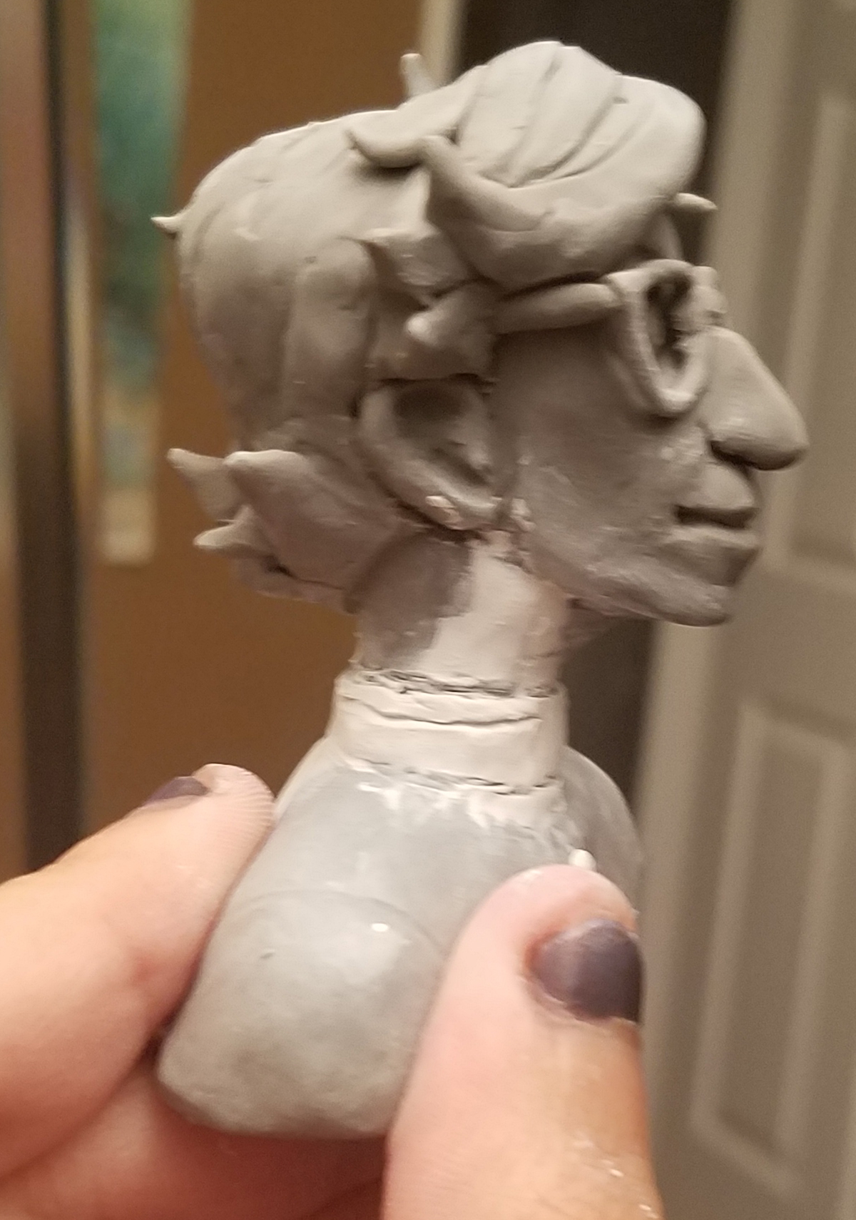 Side view of the Dante bust. In progress sculpting.